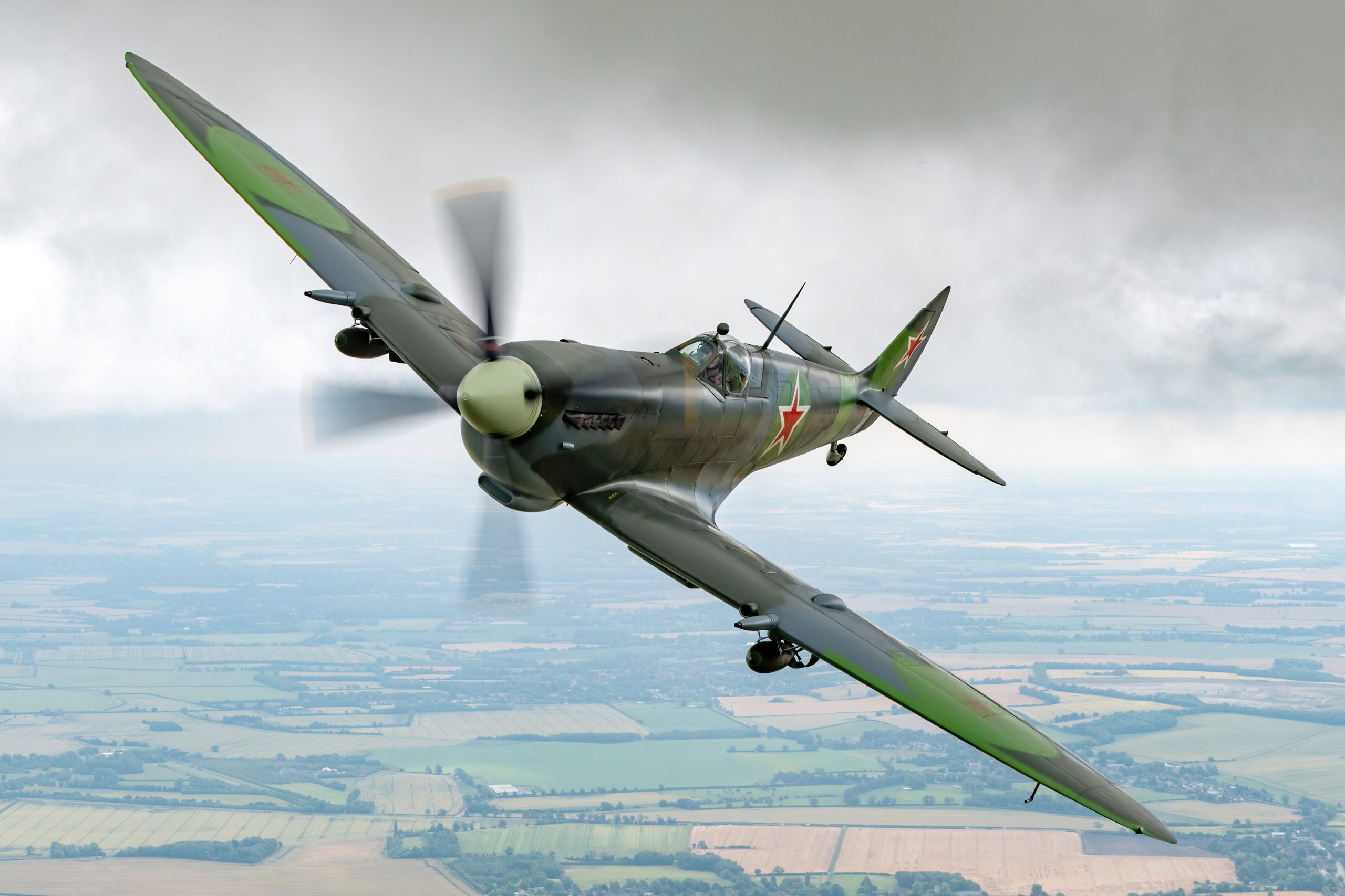 Supermarine Spitfire Mk IX photographed head-on while diving through haze