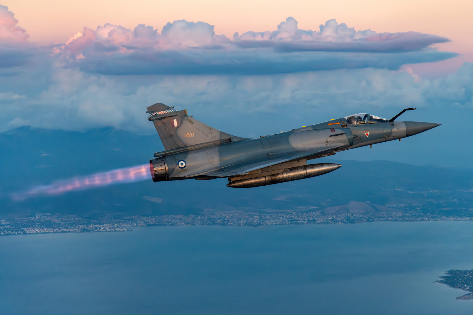 Hellenic Air Force Dassault Mirage 2000-5EG serial 547 in afterburner over the Greek coast at dusk
