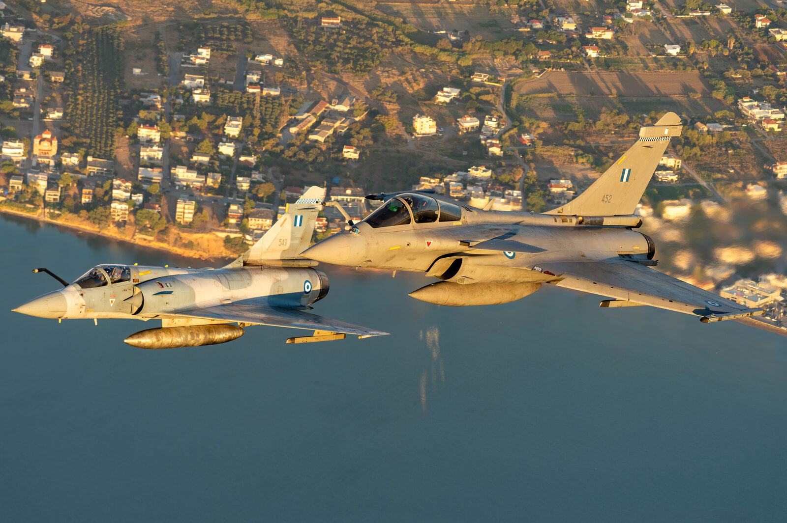 Hellenic Air Force Dassault Mirage 2000-5EG serial 549 in formation with Dassault Rafale EG serial 452 over the Greek coast