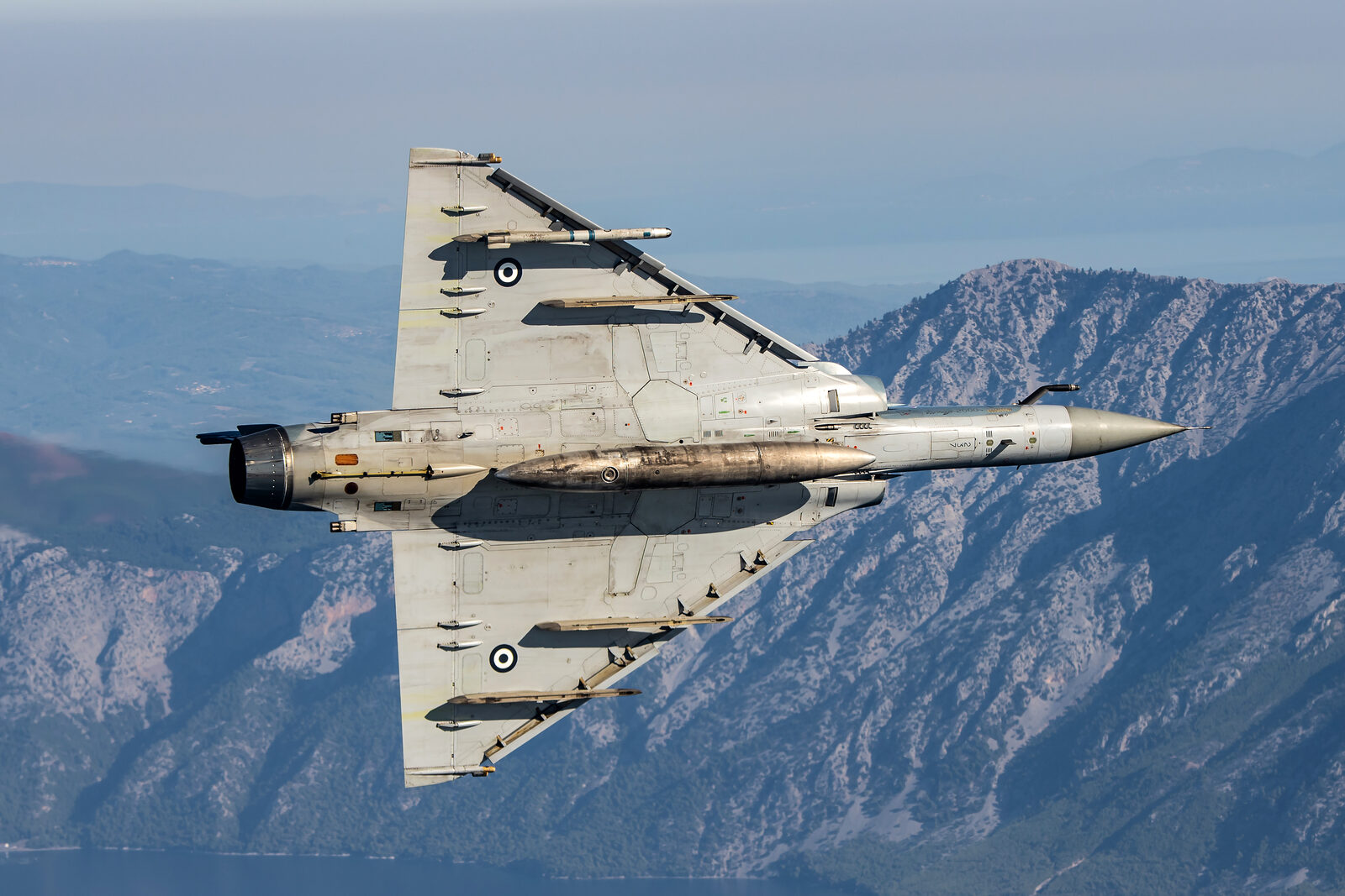 Underside plan view of a Hellenic Air Force Dassault Mirage 2000EG showing the tailless delta wing and underwing stores
