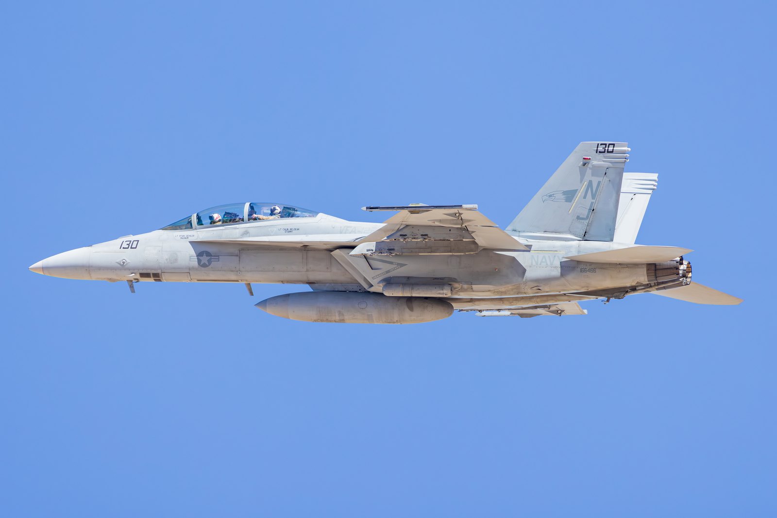 A United States Navy Boeing F/A-18F Super Hornet of VFA-122 in side profile against a clear sky over El Centro, California